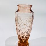 Vase en verre rose