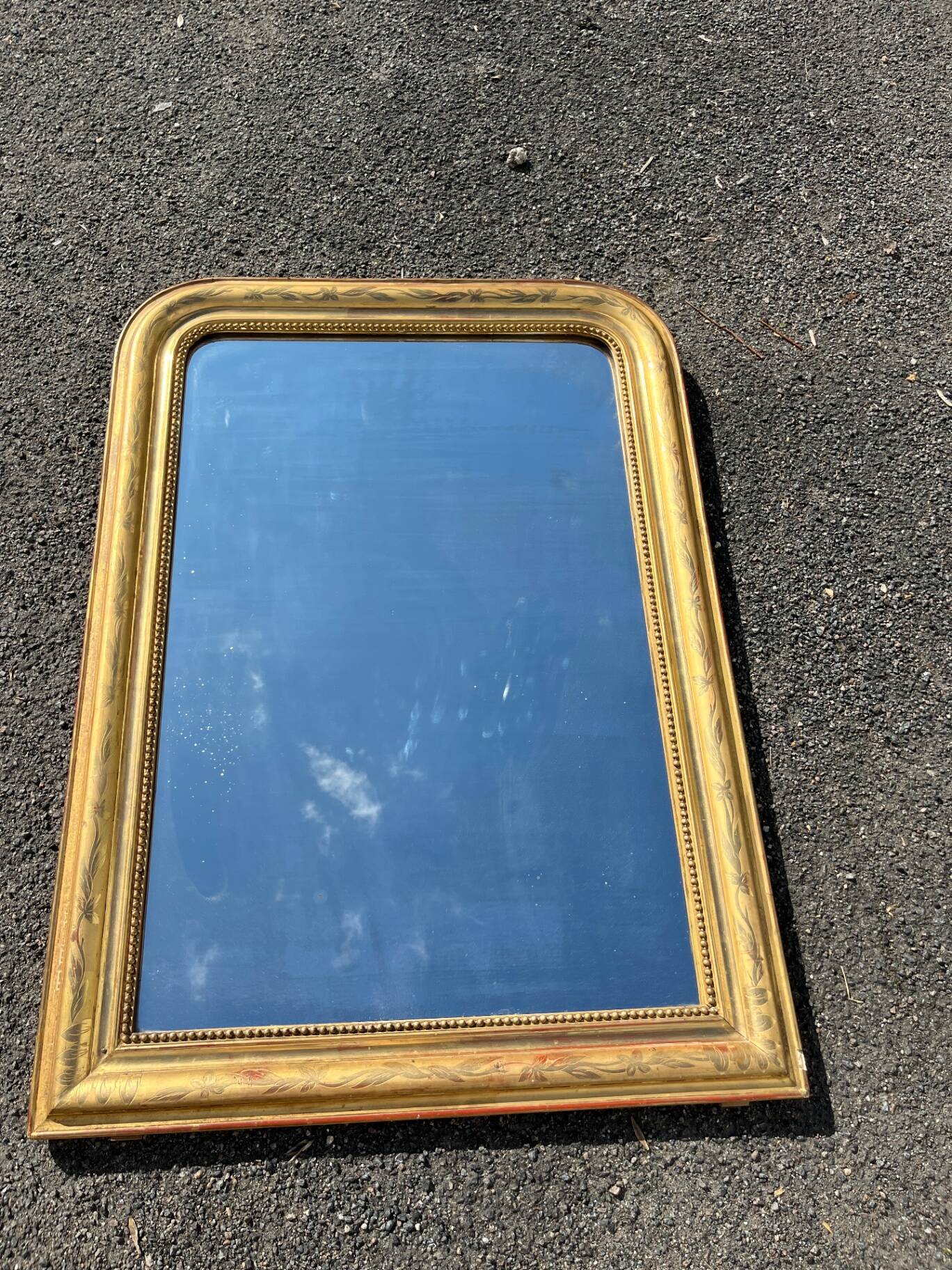 Louis-Philippe mirror in wood and gilded stucco from the 19th century, 107 cm.