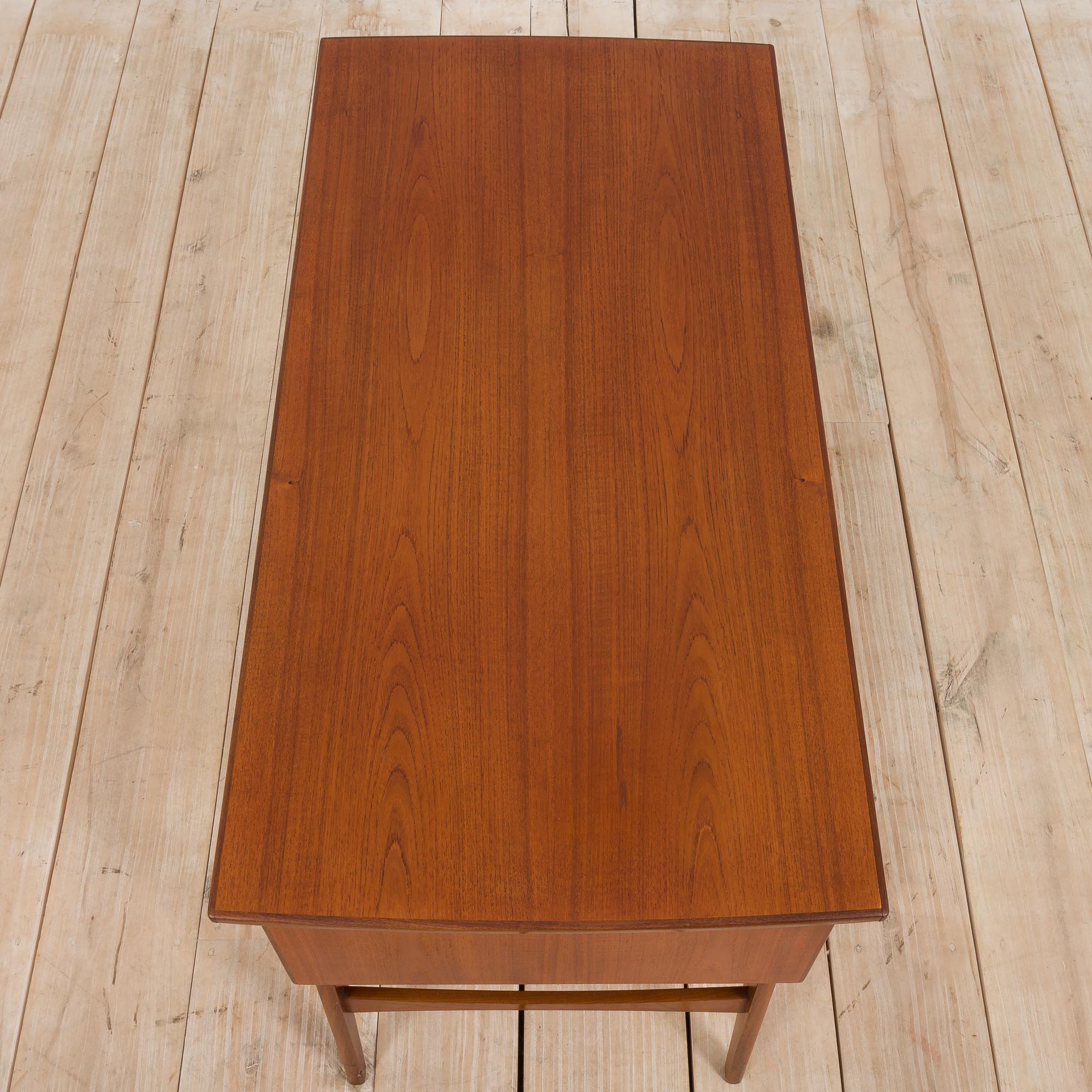 Danish mid century teak desk on sculptural base, 1960s.
