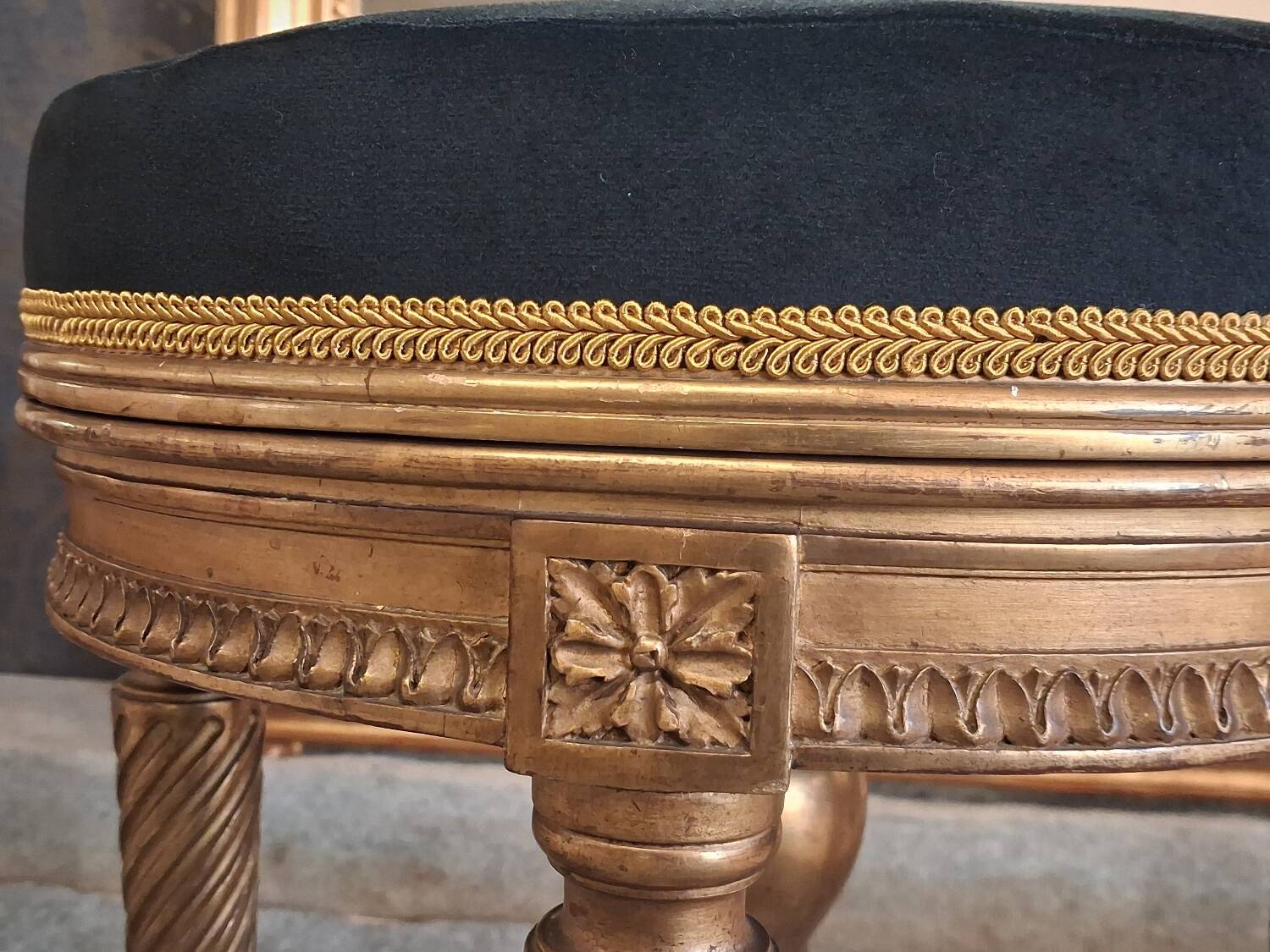 Golden wooden piano stool