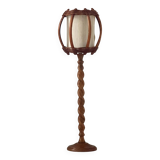 Turned wood lamp.