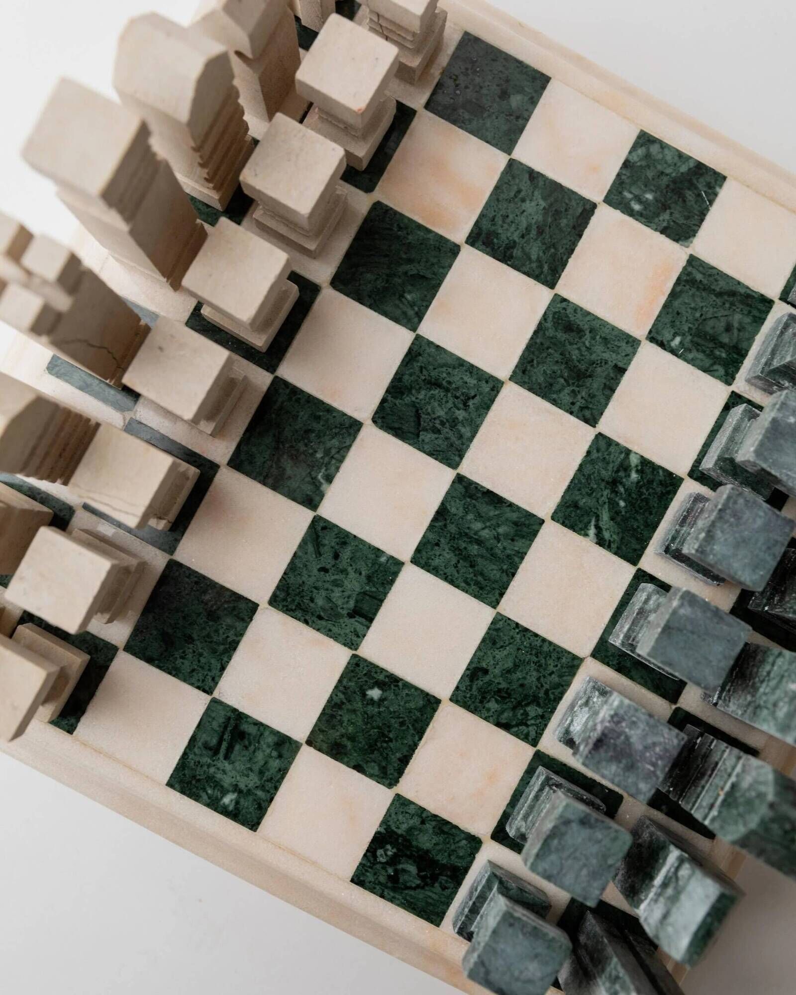 Vintage marble chess set from the 1970s, green and beige stone board, heavy design, geometric pieces, sculptural tabletop game, gift idea.