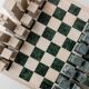 Vintage marble chess set from the 1970s, green and beige stone board, heavy design, geometric pieces, sculptural tabletop game, gift idea.