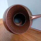 Dented copper vase or jug