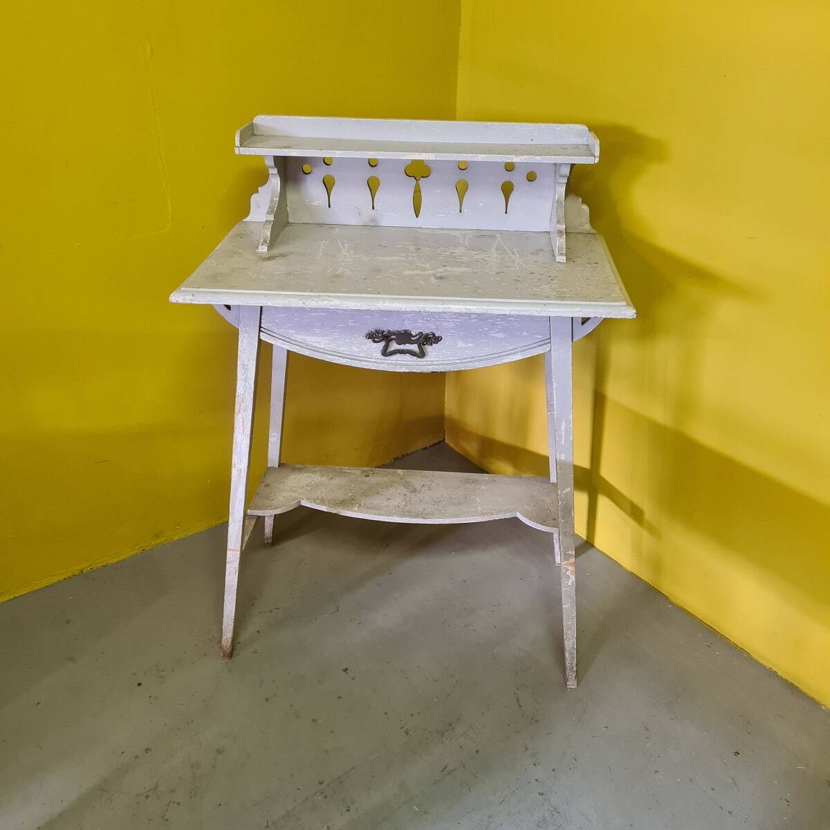 French art nouveau wooden side table with drawer from around 1900.
