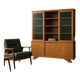 Vintage wooden display cabinet with green glass.