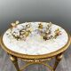 Pair of Maison Baguès wall lights with porcelain flowers, early 19th century
