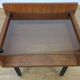 Modernist bedside table from the 1950s, wood and glass.