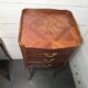 Pair of Louis XV style bedside tables in marquetry.