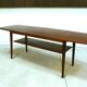 Curved Danish teak coffee table with additional shelf compartment, 1960s