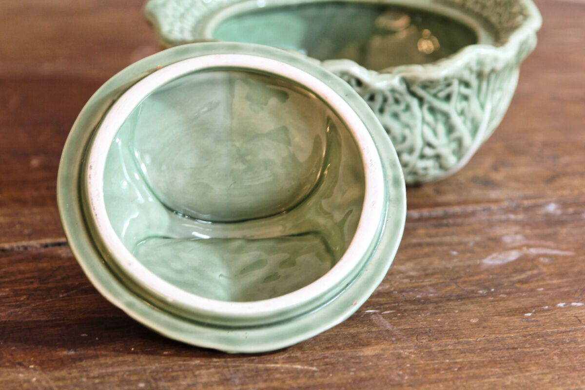 Covered pot in slip, collard greens