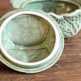 Covered pot in slip, collard greens