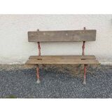 Bench with cast iron legs and branch decor