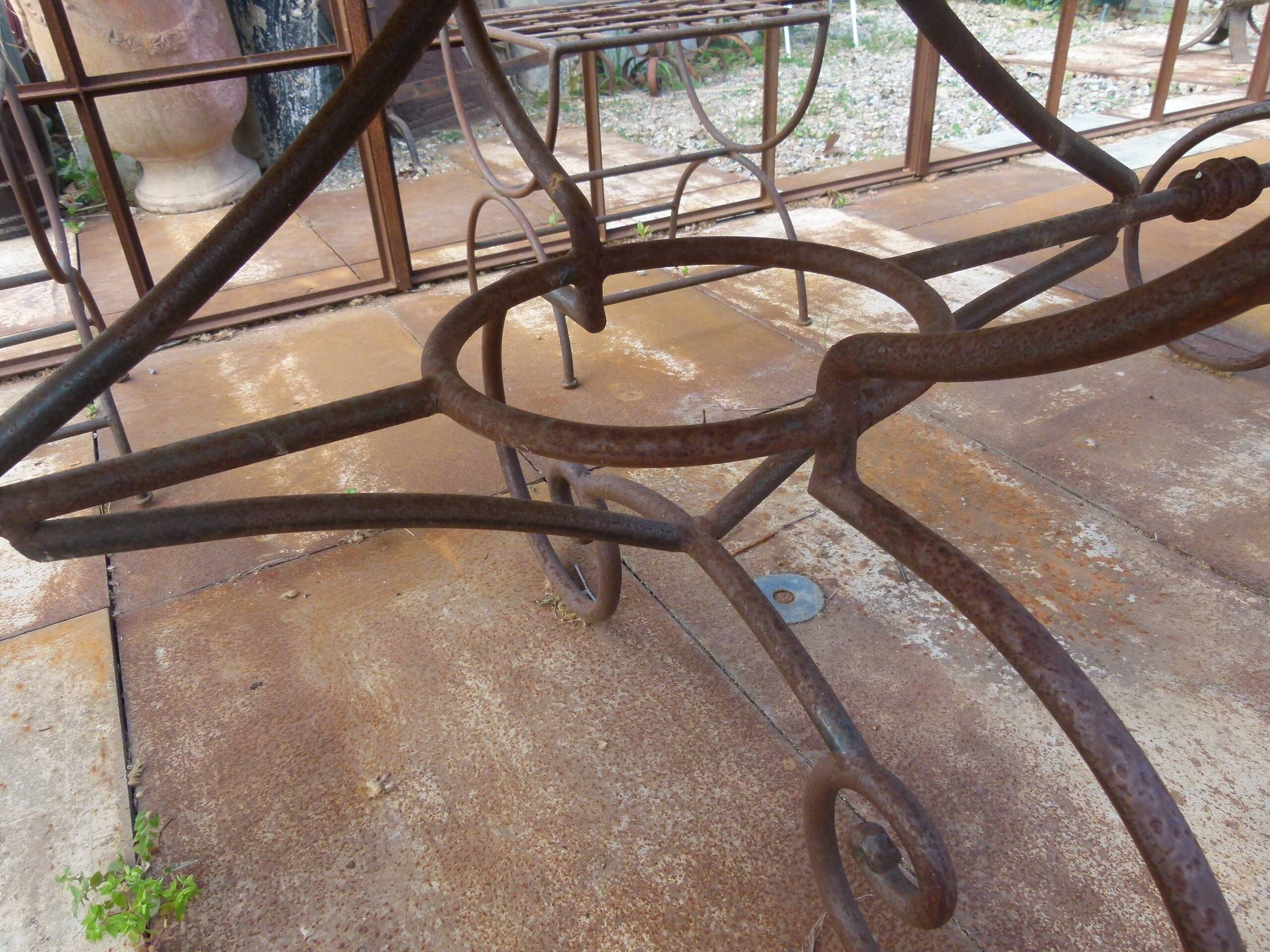 Marble table with wrought iron legs