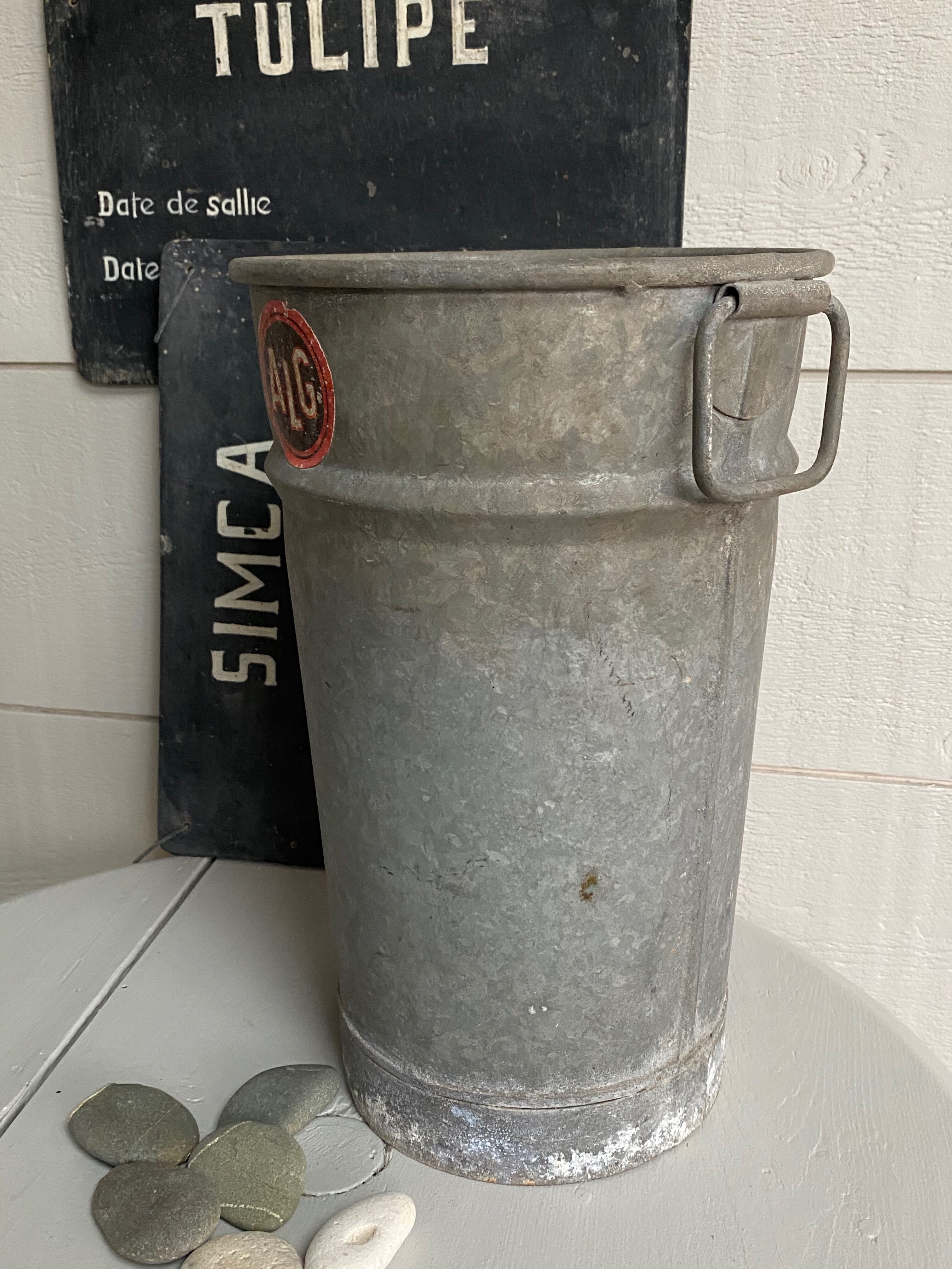 Old zinc florist vase