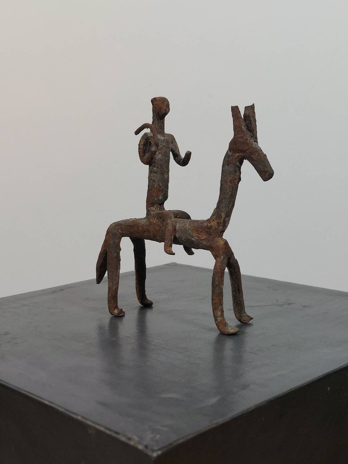 Hand-forged Dogon tribal figurine from naive East Africa.