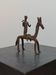 Hand-forged Dogon tribal figurine from naive East Africa.