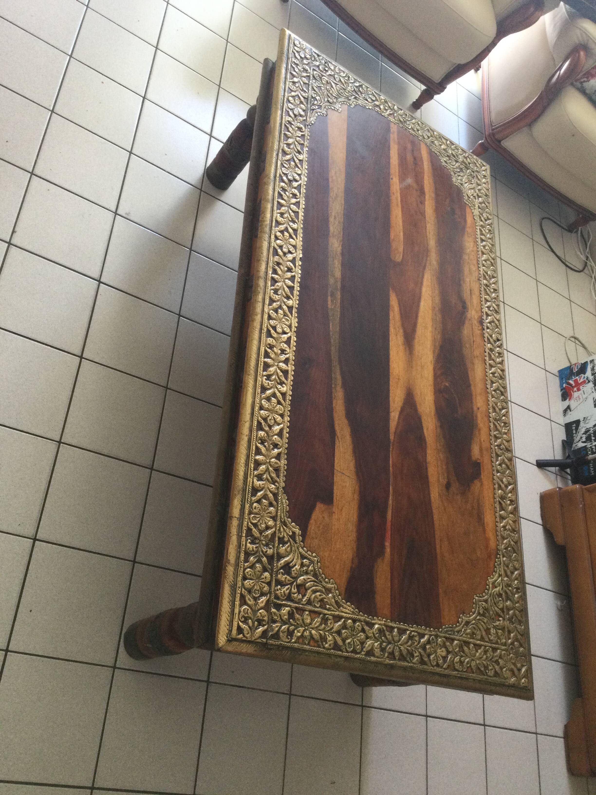 Large vintage Indian coffee table made of solid sheesham wood and brass.