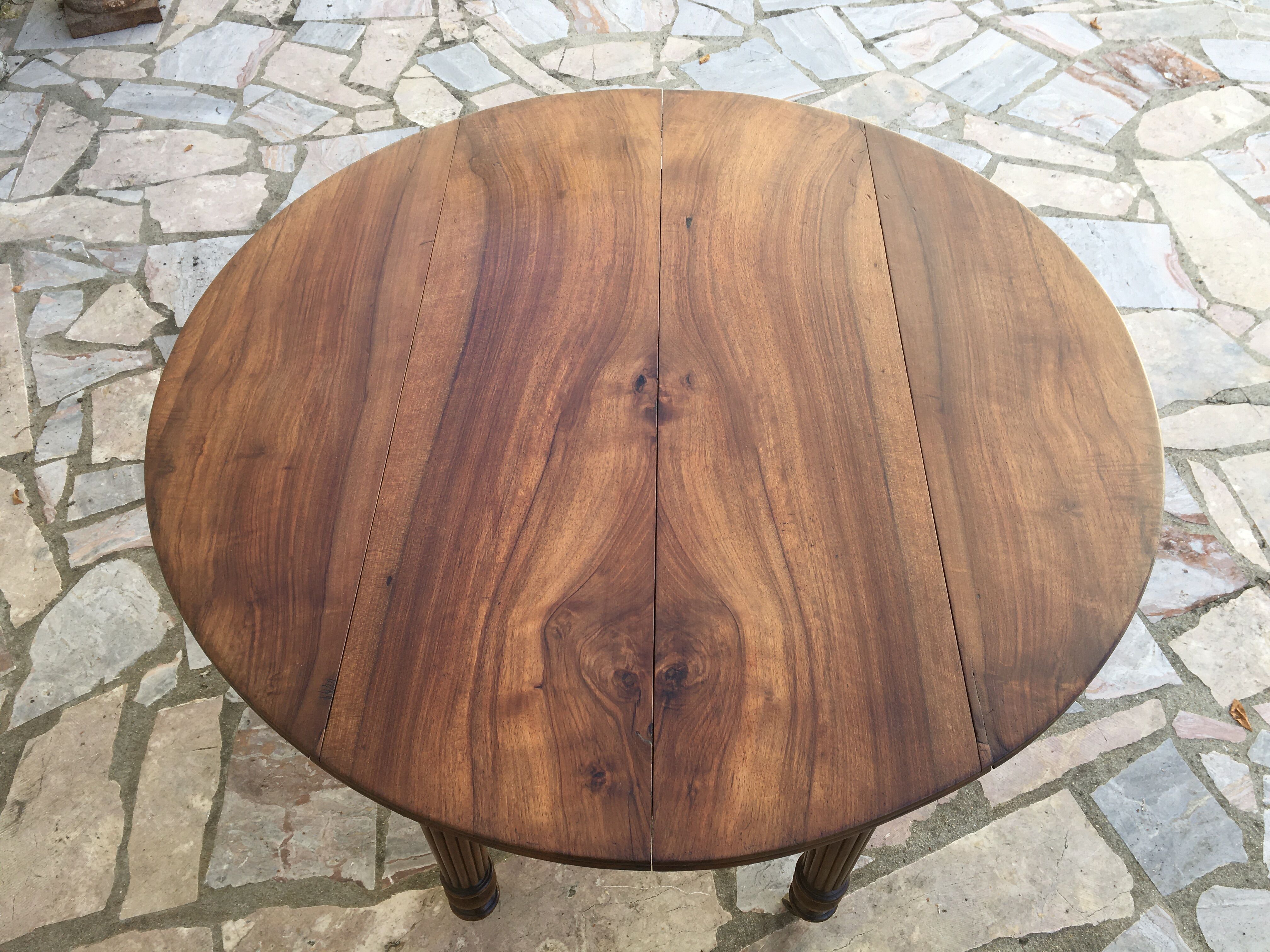 Round table 6 feet 3 solid walnut extensions