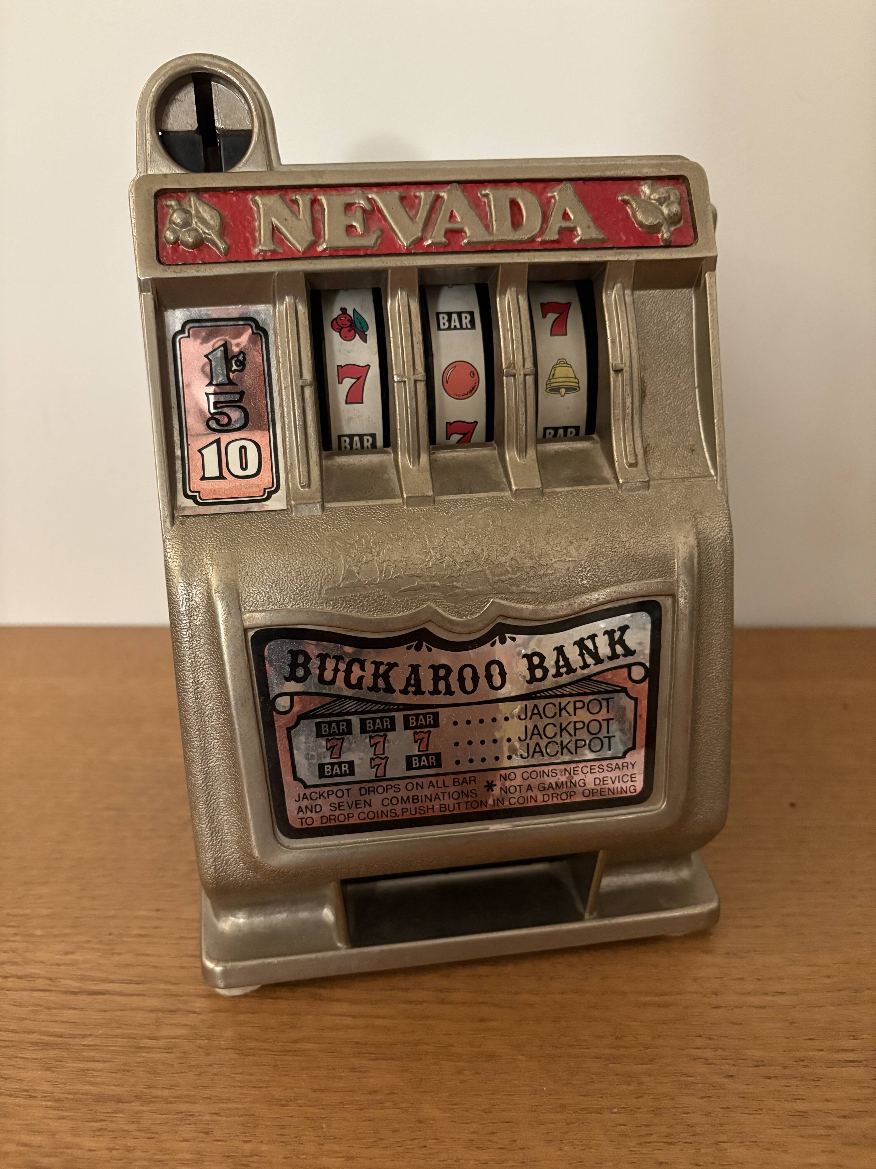 Vintage toy piggy bank/slot machine