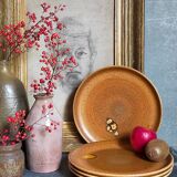 Quatre assiettes de potier en grès émaillé vintages