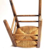 Old stool with straw seat