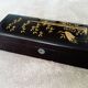 Glove box in lacquered wood decorated with a crane among bamboos. China, Japan?