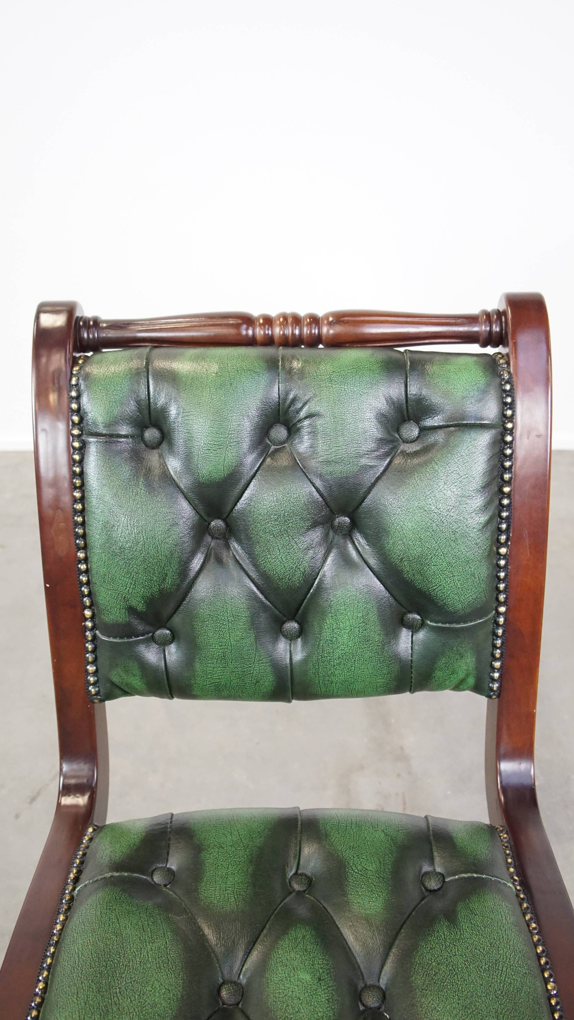 English Chesterfield office chair in green leather, height adjustable on casters