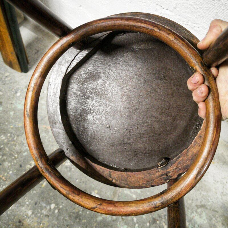 Antique children's chair in curved wood