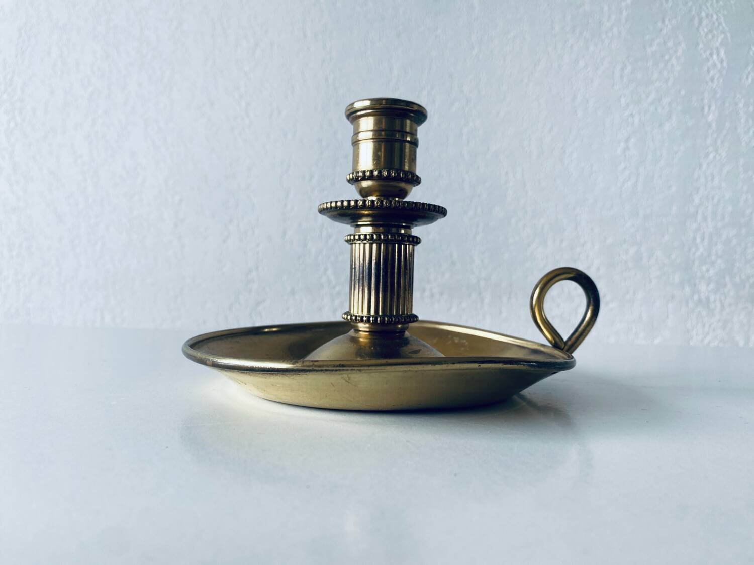 Candle holder with brass handle