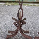 pair of andirons attributed to Raymond Subes, flame model