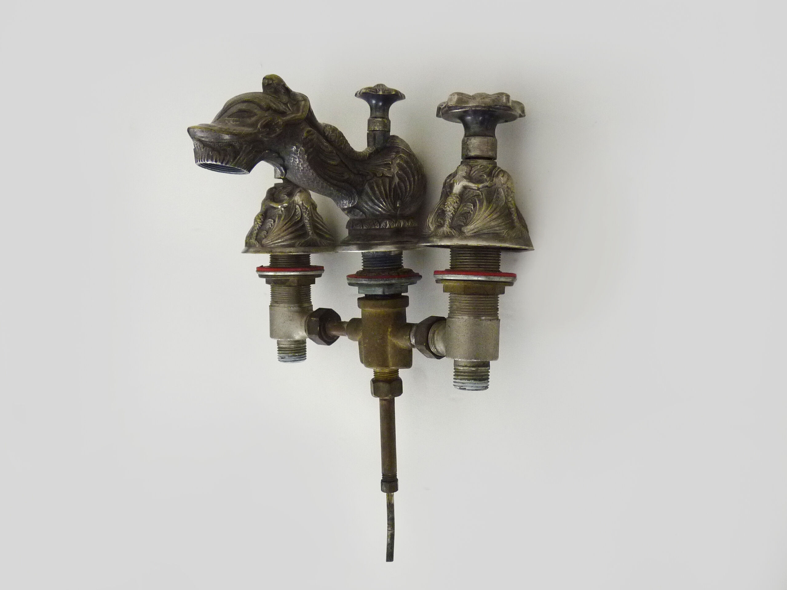 Old bathtub faucet, silver bronze kitchen with dolphin head and mermaid