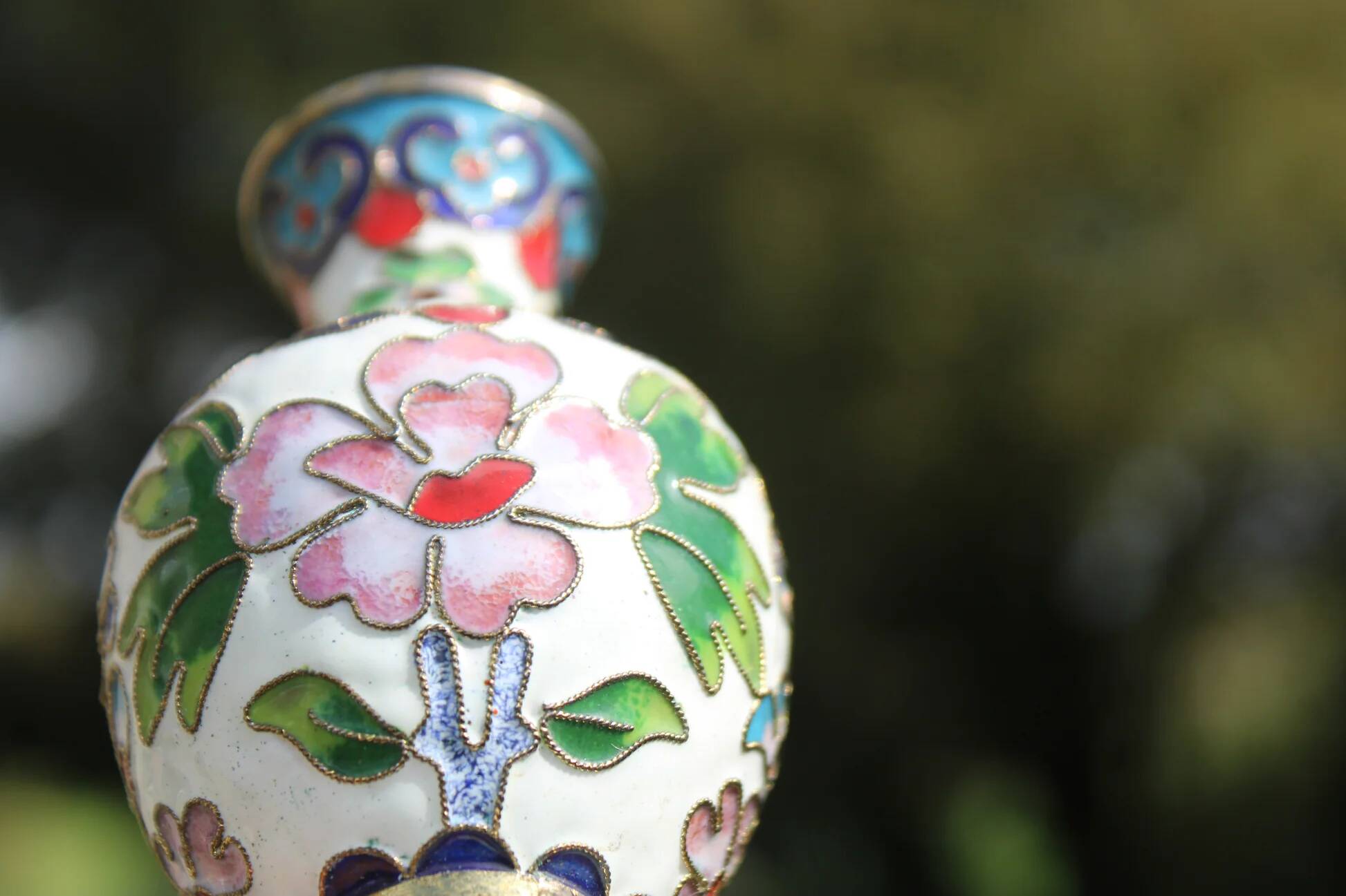Two small vintage cloisonné enamel vases with Asian floral decoration.