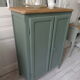 Vintage shoe cabinet smoked green wax finish, wooden top.