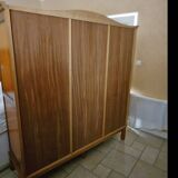 Wooden style wardrobe, 3 doors and 9 internal shelves.