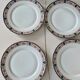 Set of 7 flat plates in Limoges porcelain