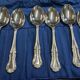 Set of 12 dessert spoons by Mappin and Webb in silver plate.