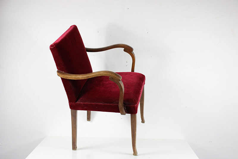 Wooden and velvet armchair