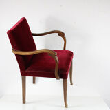 Wooden and velvet armchair