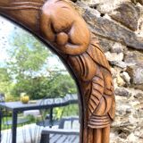 Beveled art deco mirror, carved wood