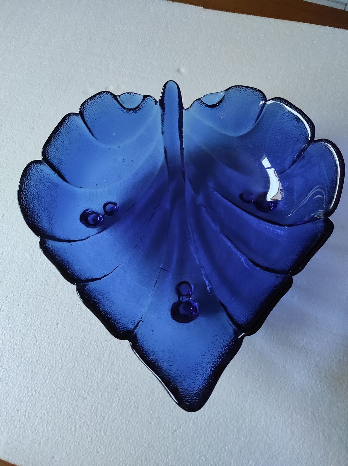 Blue glass fruit bowl
