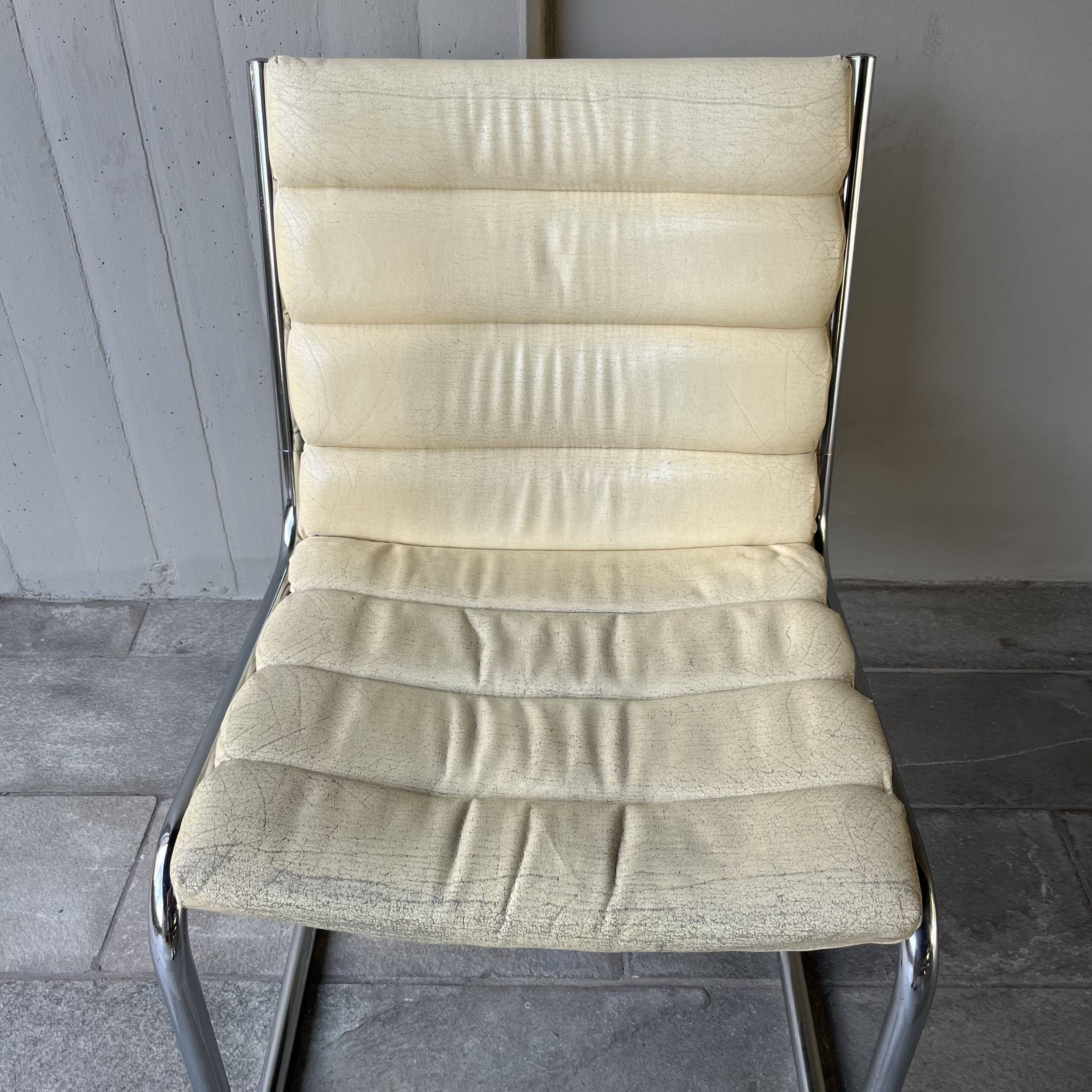 Fauteuil cantilever simili cuir crème vintage 80’s