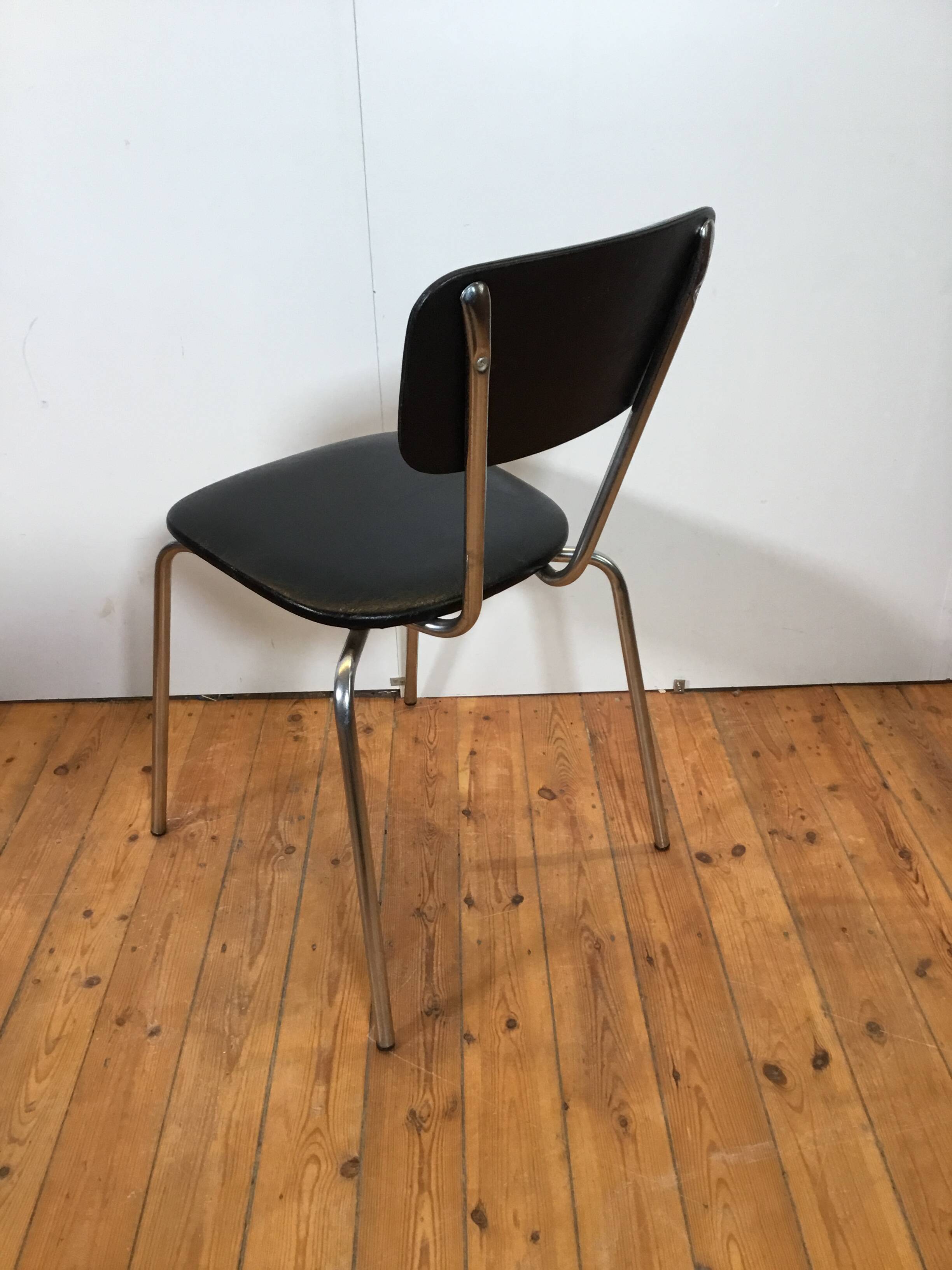 vintage chromed tubular steel stackable dining chairs