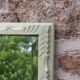 Large antique bevelled mirror in carved solid wood, green lizard – 129 × 75