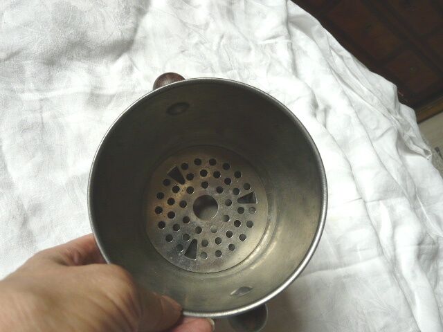 Ice in chromed metal and macassar ebony and pliers bucket