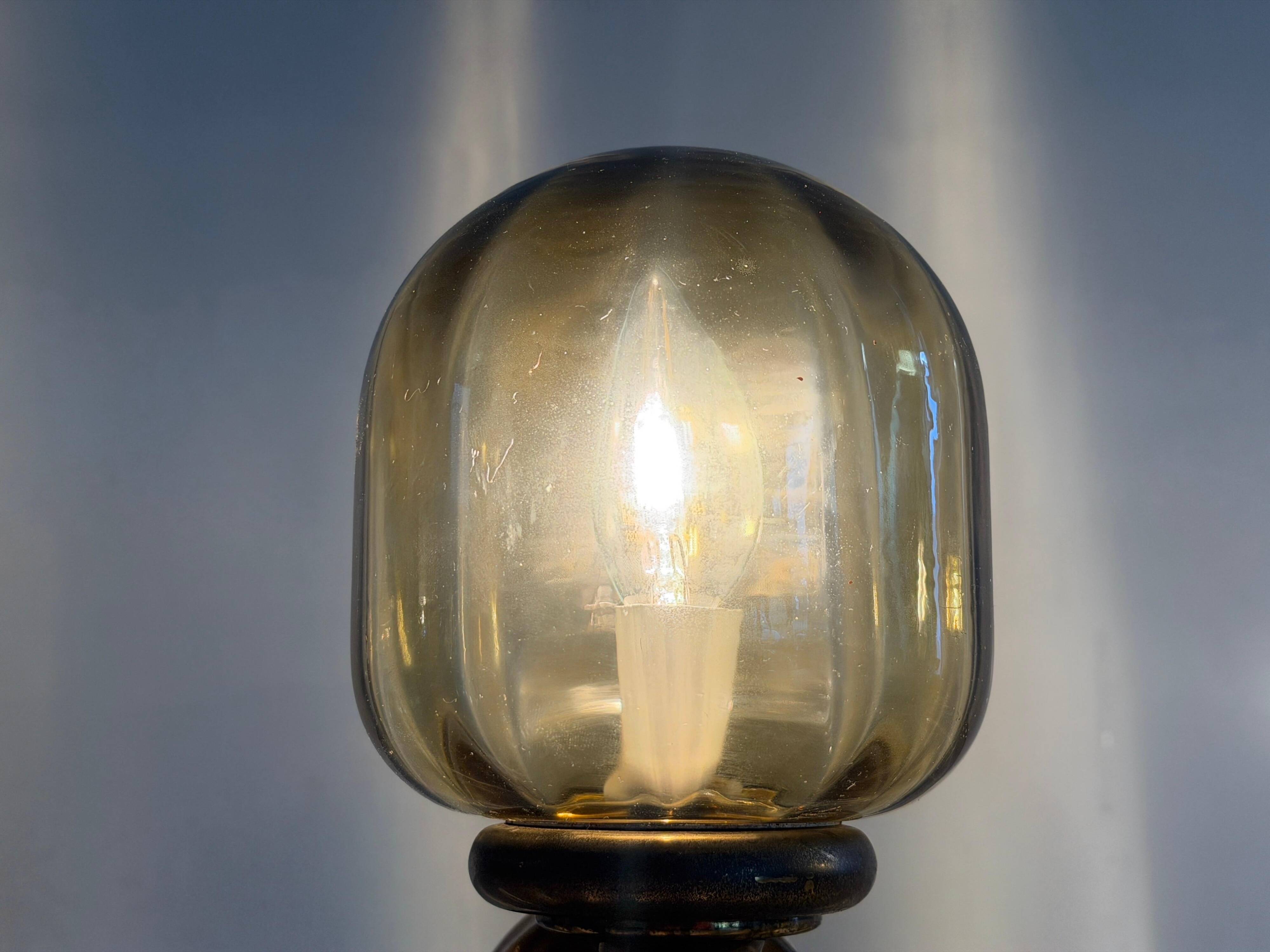 Pair of yellow glass and brass wall lights from the mid-century by N Leuchten, 1960s, Germany.