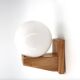 Pine wood wall light with opaque white glass globe, 1980s.