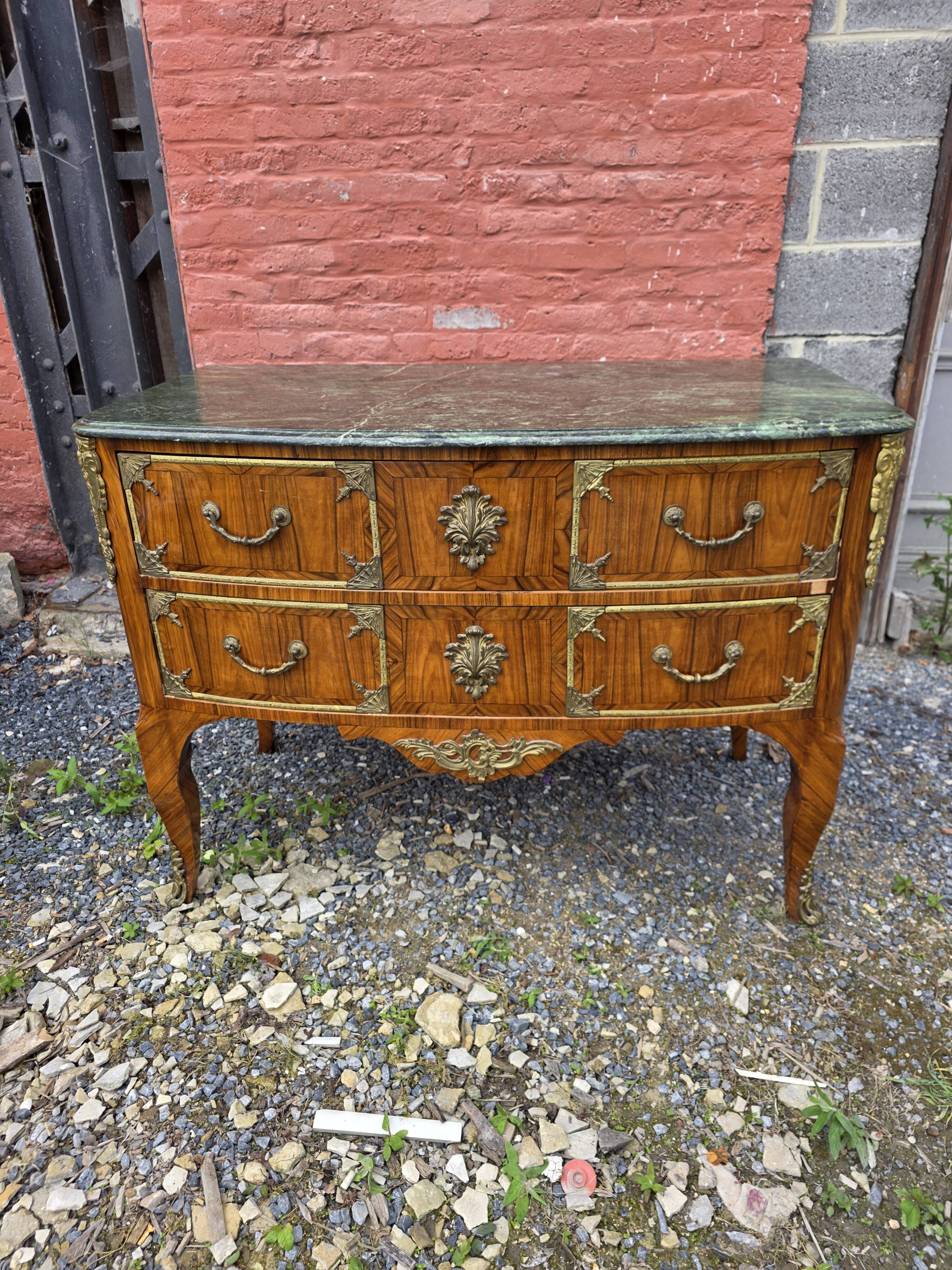 Curved Louis XV style commode in mahogany, mid-20th century.
