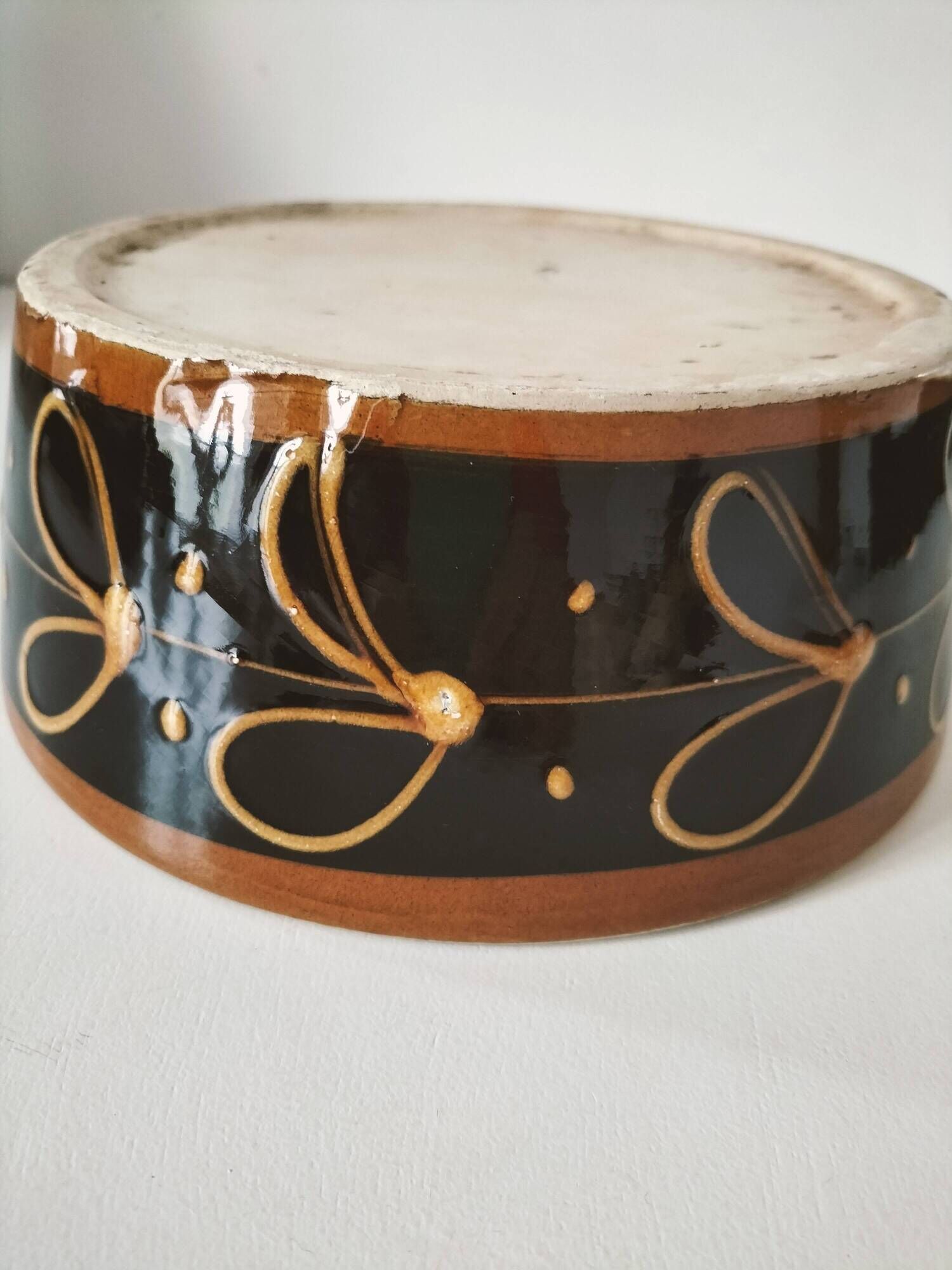 Vintage dish with black and ochre decoration and a speckled crackled interior – 1970s