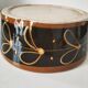 Vintage dish with black and ochre decoration and a speckled crackled interior – 1970s
